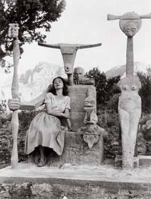 Dorothea Tanning and Max Ernst with his sculpture, Capricorn